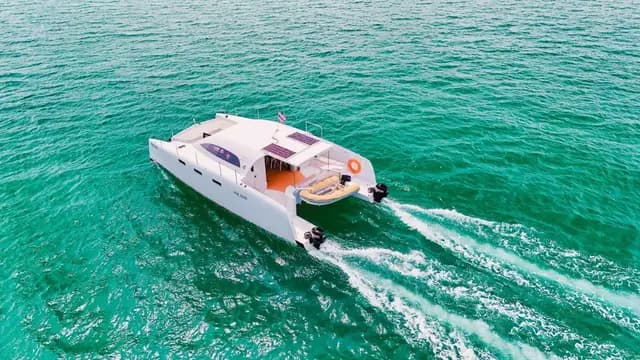 Hot Chilli Power Catamaran sailing on blue water